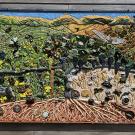 ceramic mosaic depicting the biodiversity of an organic vineyard